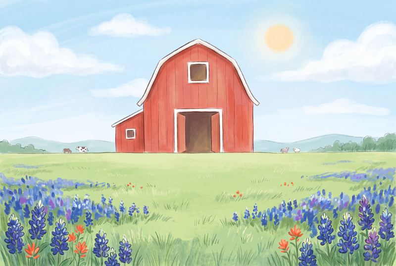 A red barn standing on green pasture under a wide sky.